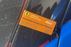 mikeM296 1 – Sage Auto Sport Orange Ferrari Challenge sticker with the prancing horse logo on a car window.