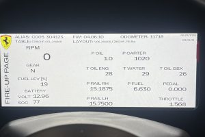 mikeM296 2 – Sage Auto Sport Ferrari digital dashboard showing ignition screen with RPM at 0, fuel, battery, and odometer reading 11,718 miles, date 06.05.2026, time 09:09:41, and various system readouts like P CARTER 1020 and P FUEL 6.630.
